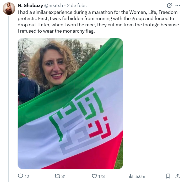 Piulada que mostra una dona amb la bandera feminista i el text: "vaig tenir una experiència similar a la marató per la protestat "Dona, vida, llibertat". Primer, em van prohibir amb el grup. Després, quan vaig guanyar la cursa, em van treure de totes les fotos perquè em vaig negar a portar la bandera de la monarquia".